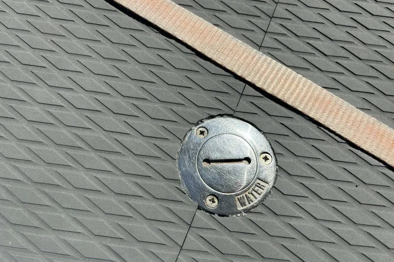 Slide: The Image of Textured deck of 2009 Class 40 Akilaria RC2 with water access cap. - 73