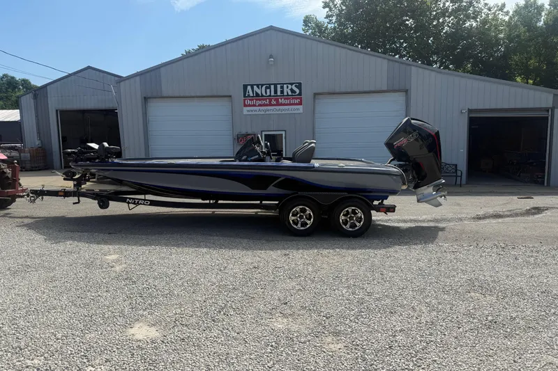 Slide: The Image of 2021 Nitro Z20 Pro boat on trailer outside Anglers Outpost & Marine. - 17
