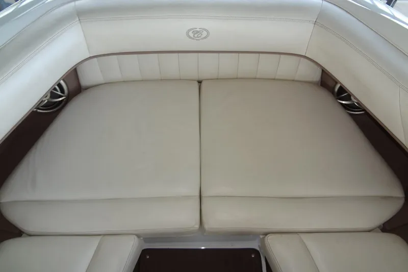 Slide: The Image of Luxurious beige seating in a 2008 Cobalt 302 boat interior. - 14