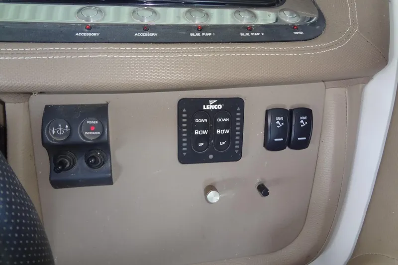 Slide: The Image of Control panel of a 2008 Cobalt 302 boat with various switches and indicators. - 21