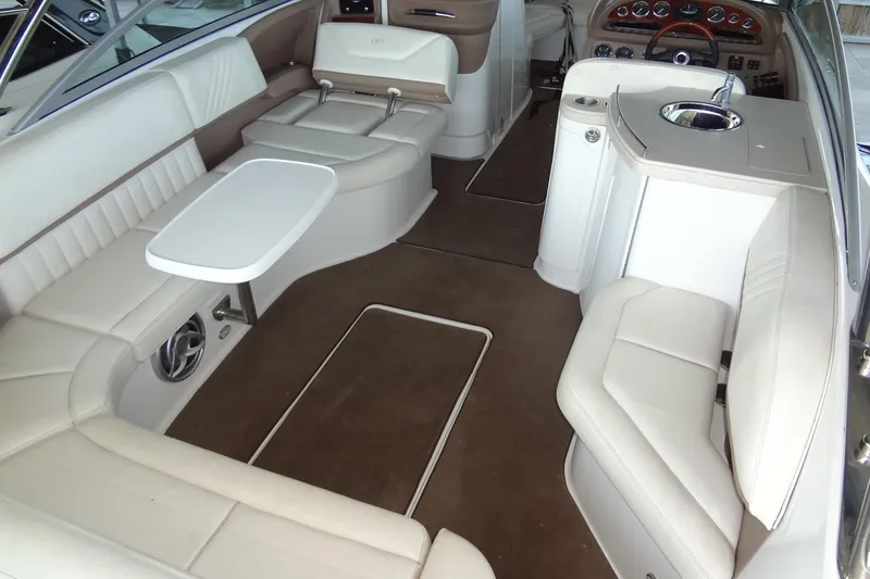 Slide: The Image of 2008 Cobalt 302 boat interior with luxurious seating and modern amenities. - 33