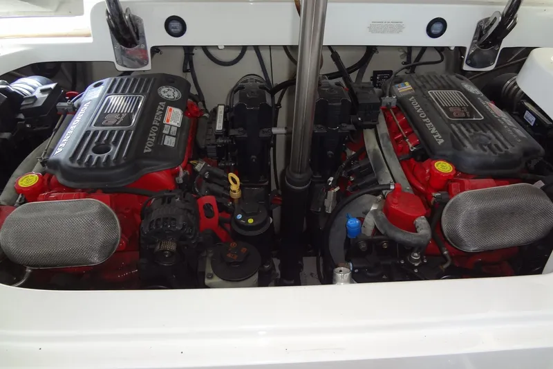 Slide: The Image of Twin Volvo Penta engines in a 2008 Cobalt 302 boat, showcasing powerful marine performance. - 43