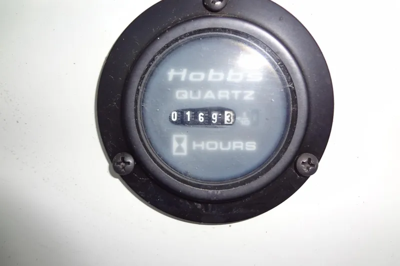 Slide: The Image of Hour meter reading 1693 on 2008 Cobalt 302 boat. - 46