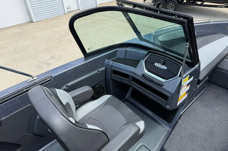 Slide: The Image of Dashboard of 2025 Lund 189 Tyee GL boat with speedometer and gauges. - 21