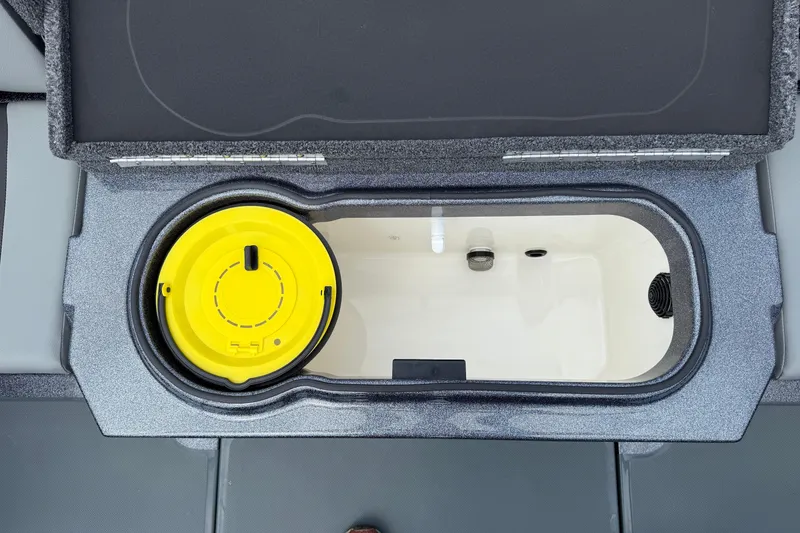 Slide: The Image of Interior view of 2025 Lund 189 Tyee GL boat with storage compartment and handles. - 28