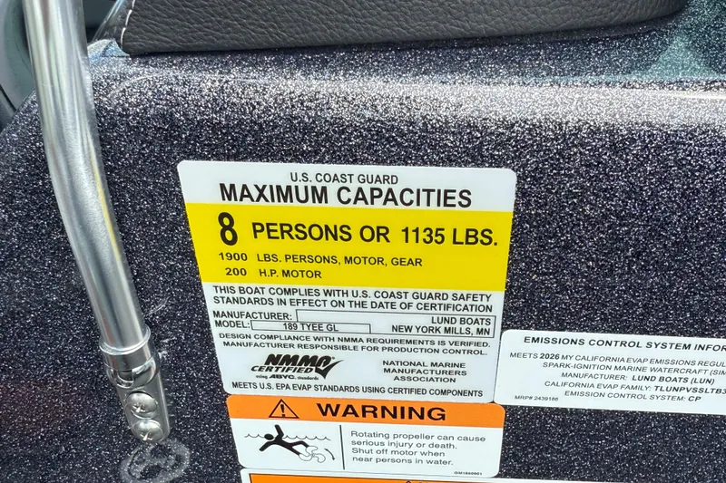 Slide: The Image of 2025 Lund 189 Tyee GL boat storage compartment with branded bag. - 32