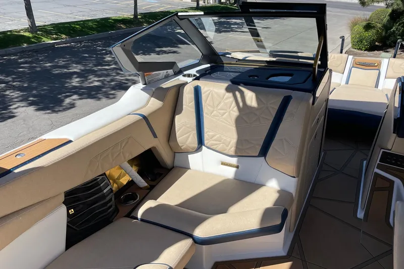 Slide: The Image of 2024 Nautique Super Air Nautique G25 Paragon interior with luxurious seating and modern design. - 10