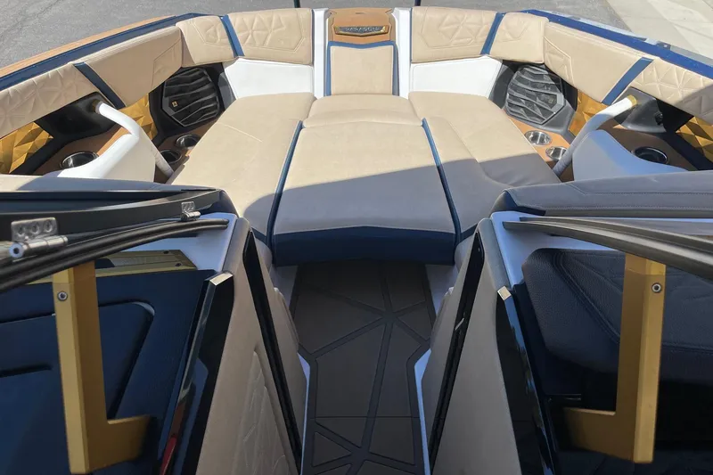 Slide: The Image of 2024 Nautique Super Air Nautique G25 Paragon interior with luxurious seating and modern design. - 11