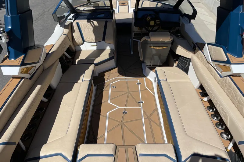 Slide: The Image of 2024 Nautique Super Air Nautique G25 Paragon interior with luxurious seating and modern design. - 5