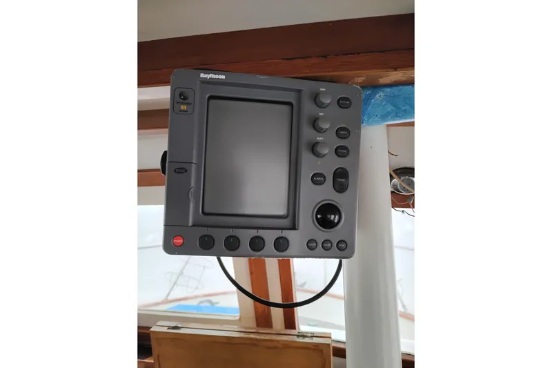 Slide: The Image of Raytheon marine navigation system on 1979 Transpac Eagle 36 Trawler. - 24