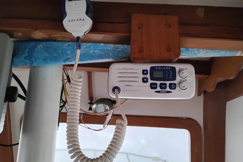 Slide: The Image of VHF radio equipment inside a 1979 Transpac Eagle 36 Trawler boat cabin. - 25