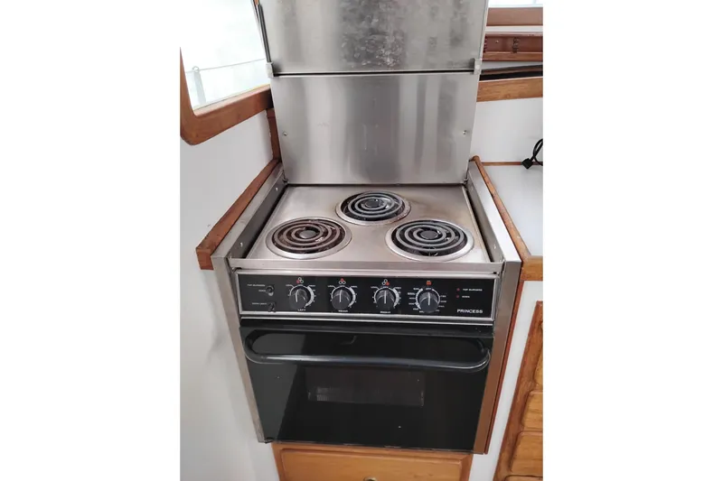 Slide: The Image of Electric stove and oven in 1979 Transpac Eagle 36 Trawler kitchen. - 30