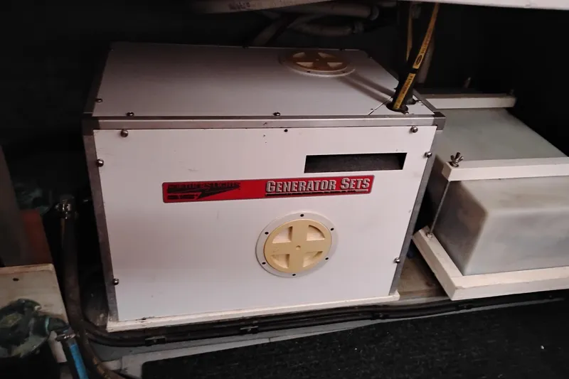 Slide: The Image of Generator set inside a 1979 Transpac Eagle 36 Trawler boat engine room. - 48