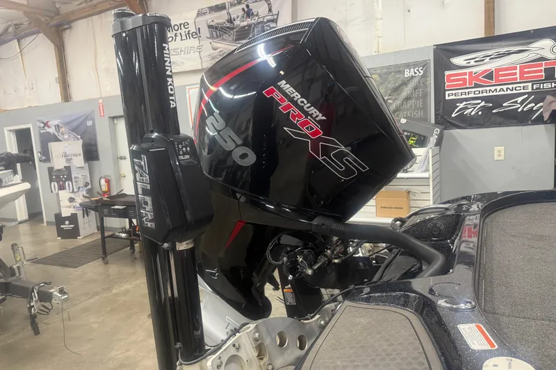 Slide: The Image of 2021 Nitro Z21 Pro boat with Mercury Pro XS 250 engine in a showroom. - 10
