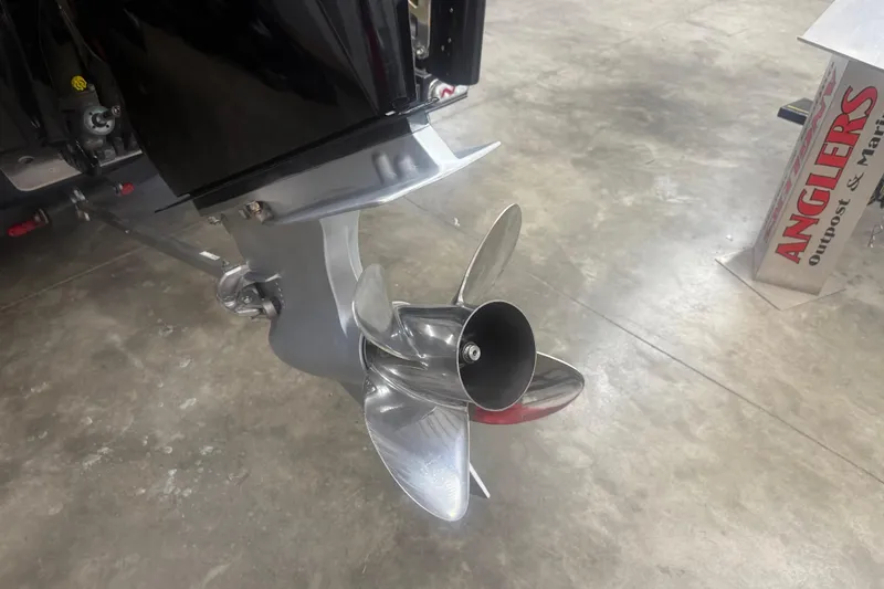 Slide: The Image of 2021 Nitro Z21 Pro boat propeller on display in a showroom. - 9