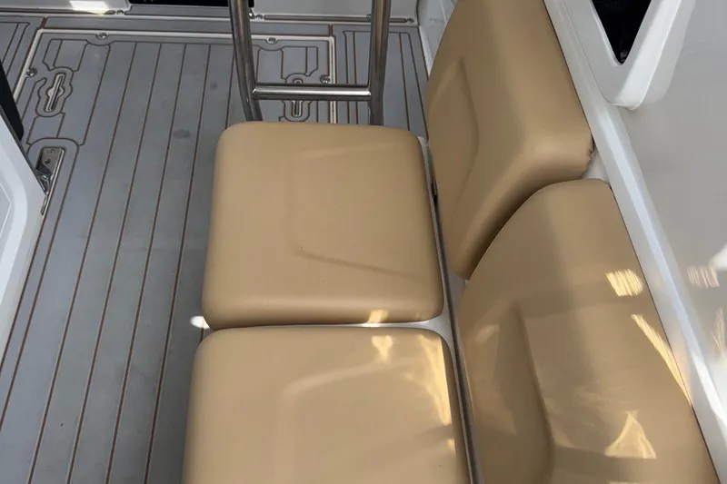 Slide: The Image of 2023 Flexboat Flex 680 Explorer interior with beige seating and sleek flooring. - 14