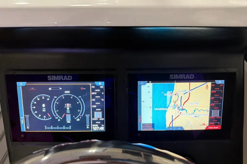 Slide: The Image of Simrad navigation displays on 2023 Flexboat Flex 680 Explorer dashboard. - 20