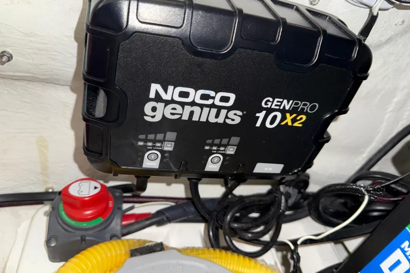 Slide: The Image of NOCO Genius GENPRO 10X2 charger in 2023 Flexboat Flex 680 Explorer. - 23
