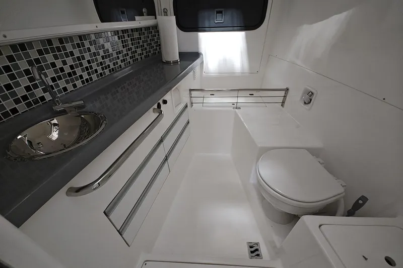 Slide: The Image of Modern bathroom interior of 2023 Flexboat Flex 680 Explorer with sleek fixtures and mosaic tiles. - 28