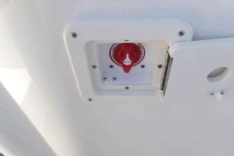 Slide: The Image of Battery switch on a 2026 Key West 239 FS boat, featuring a red dial. - 17