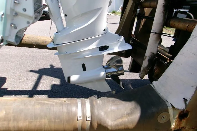 Slide: The Image of 2026 Key West 239 FS boat motor and propeller close-up. - 4