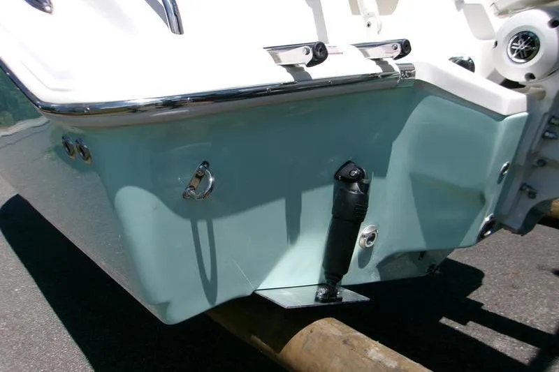 Slide: The Image of 2026 Key West 239 FS boat transom with trim tab and hardware details. - 6
