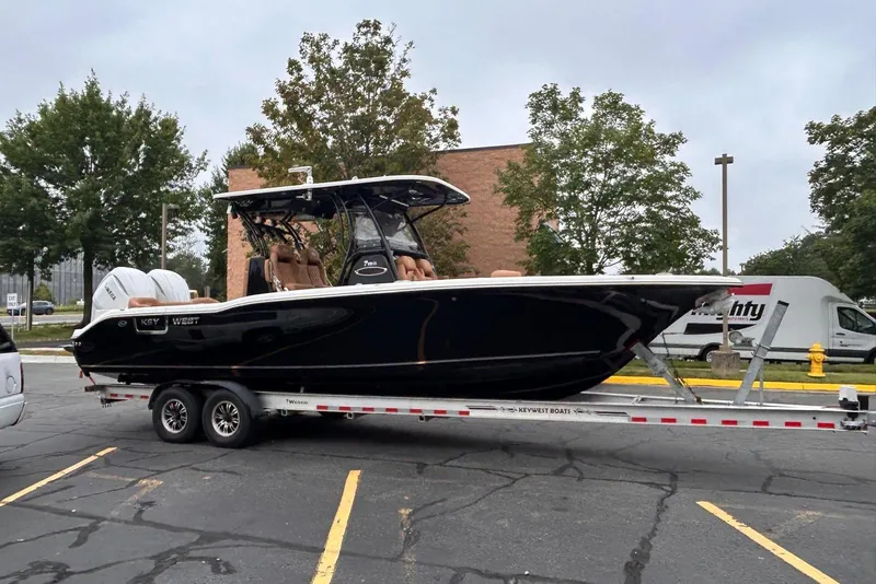 The Image of 2026 Key West 291 FS boat on trailer in parking lot. - 0