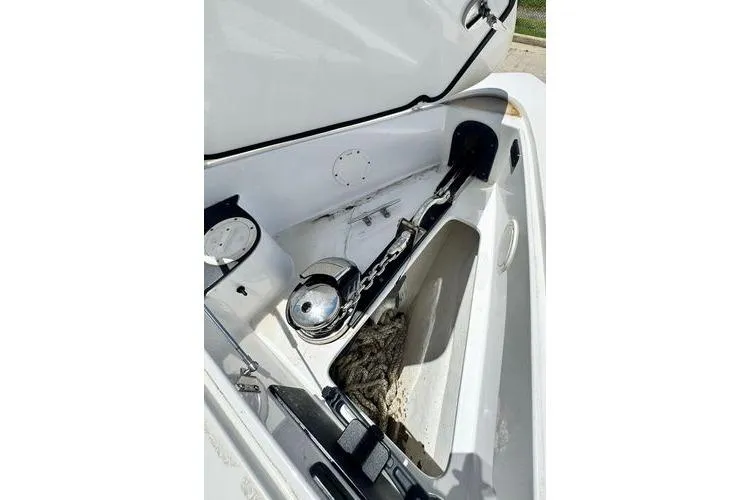 Slide: The Image of 2019 Nor-Teck 390 Sport Center Console anchor compartment with chain and rope. - 18