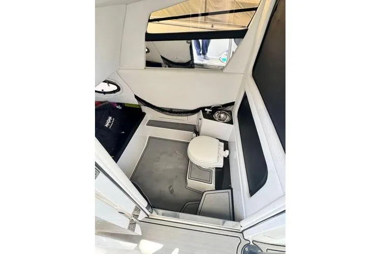 Slide: The Image of Interior of 2019 Nor-Teck 390 Sport Center Console with compact marine toilet. - 19