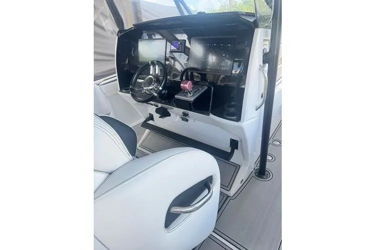 Slide: The Image of 2019 Nor-Teck 390 Sport Center Console dashboard with modern controls and steering wheel. - 21
