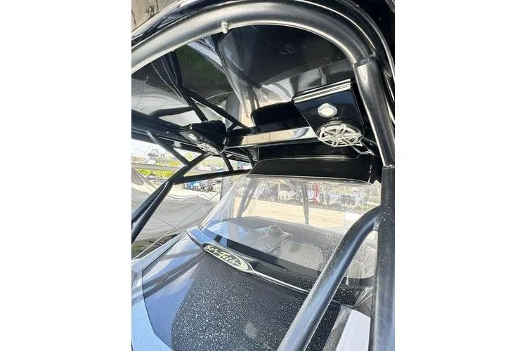 Slide: The Image of 2019 Nor-Teck 390 Sport Center Console interior with sleek black design and modern features. - 29