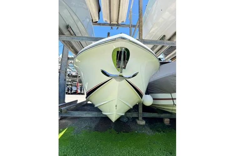 Slide: The Image of 2019 Nor-Teck 390 Sport Center Console boat in storage, front view. - 6
