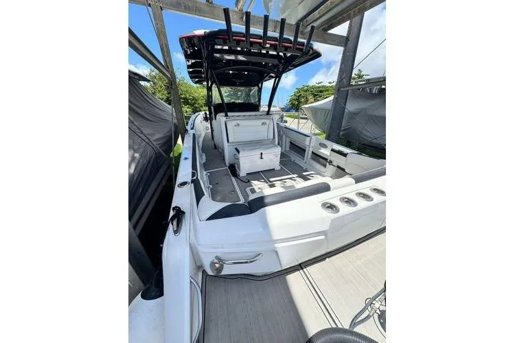 Slide: The Image of 2019 Nor-Teck 390 Sport Center Console boat with spacious seating and sleek design. - 9