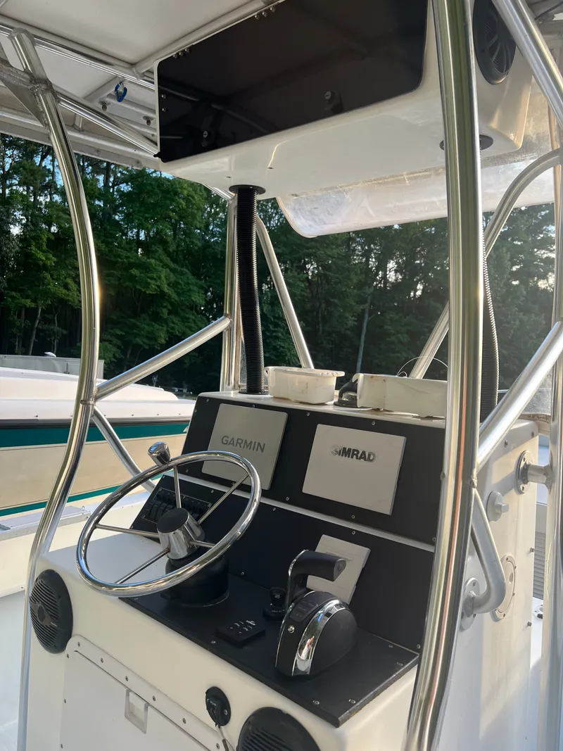 Slide: The Image of Dusky 256 boat console with Garmin and Simrad equipment, 1998 model. - 13