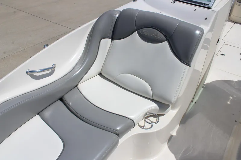 Slide: The Image of 2006 Sea Ray 270 Sundeck boat seat with gray and white upholstery. - 24