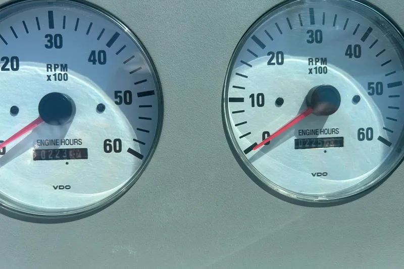 Slide: The Image of Close-up of 2001 Formula 330 SS tachometers showing engine hours and RPM. - 6