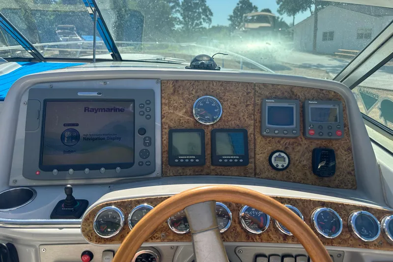 Slide: The Image of Dashboard of a 2007 Formula 400 Super Sport boat with navigation display and gauges. - 20