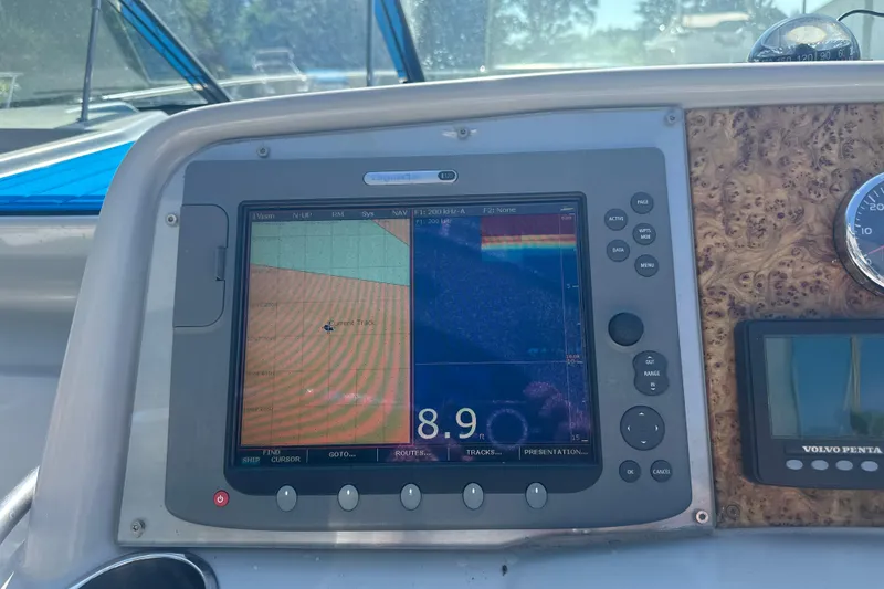 Slide: The Image of Dashboard of a 2007 Formula 400 Super Sport boat with navigation display. - 26