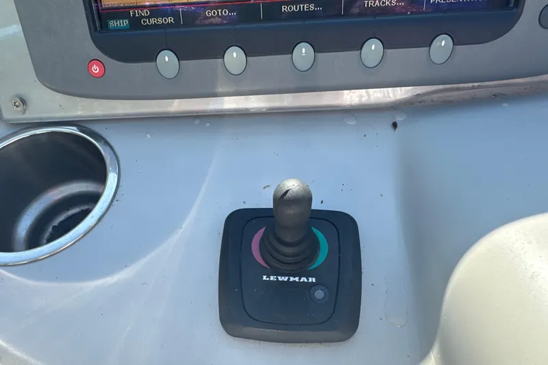 Slide: The Image of Control panel of a 2007 Formula 400 Super Sport boat with Lewmar joystick. - 27