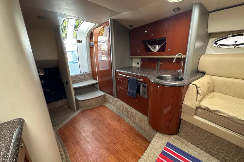 Slide: The Image of Interior of 2007 Formula 400 Super Sport yacht with kitchenette and seating area. - 32