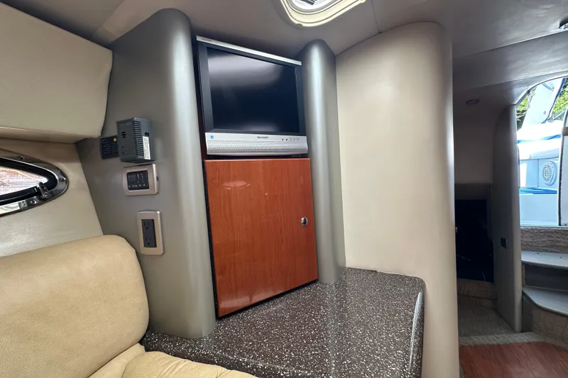 Slide: The Image of Interior of 2007 Formula 400 Super Sport yacht with TV and seating area. - 33