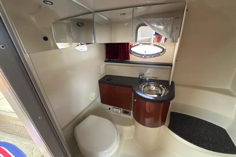 Slide: The Image of 2007 Formula 400 Super Sport yacht bathroom with sink, toilet, and mirror. - 41