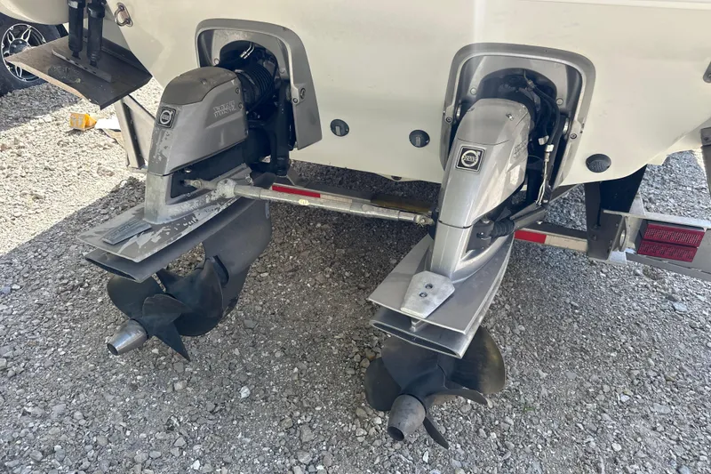 Slide: The Image of 2007 Formula 400 Super Sport boat with dual outboard motors on gravel. - 53