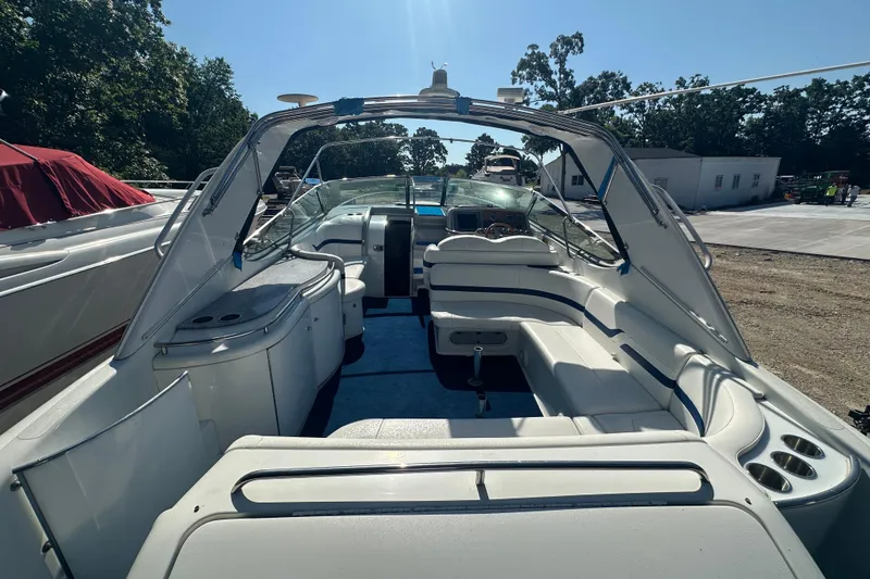 Slide: The Image of 2007 Formula 400 Super Sport boat interior with white seating and open cockpit. - 8