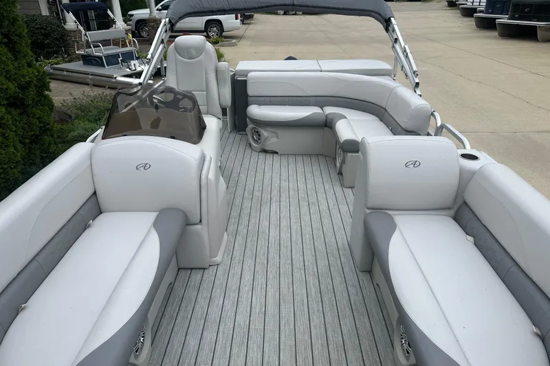 Slide: The Image of 2018 Avalon GS2185 pontoon boat with spacious seating and sleek design. - 2