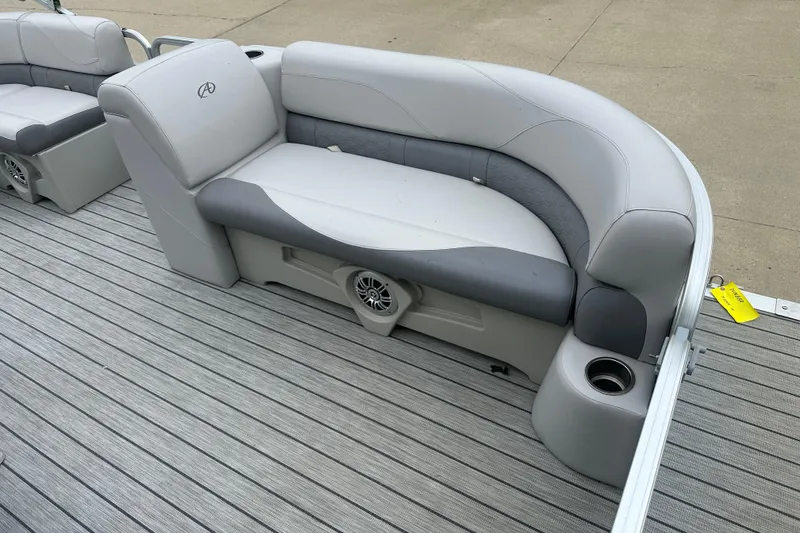 Slide: The Image of 2018 Avalon GS2185 boat seating with gray upholstery and integrated speaker on deck. - 3