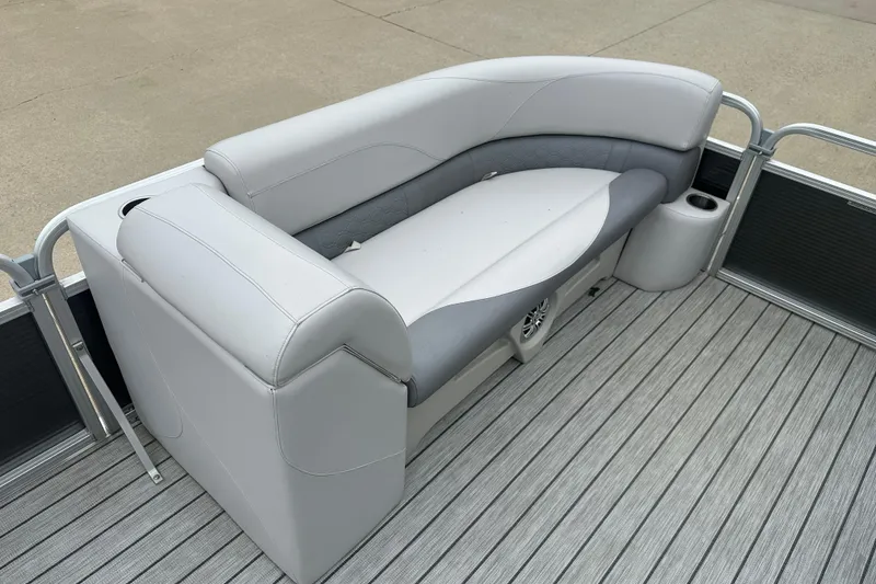 Slide: The Image of Luxurious seating on 2018 Avalon GS2185 pontoon boat with gray upholstery and cup holder. - 4