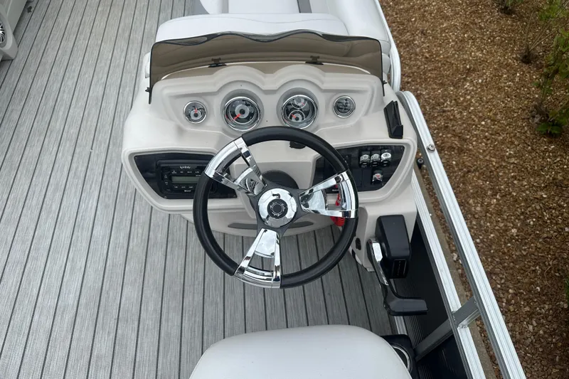 Slide: The Image of Steering console of 2018 Avalon GS2185 boat with gauges and controls. - 9