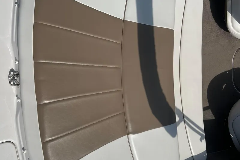 Slide: The Image of 2008 Four Winns H190 boat interior with brown and white seating. - 35