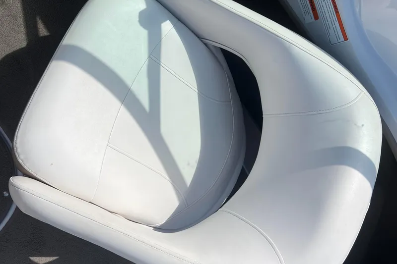 Slide: The Image of White leather seat on a 2008 Four Winns H190 boat. - 42